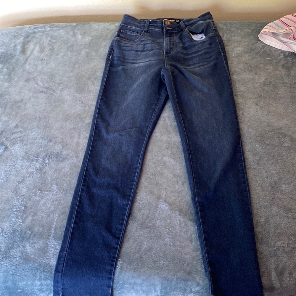 Have been worn multiple times. Dark blue.